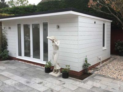 Large white rear garden room