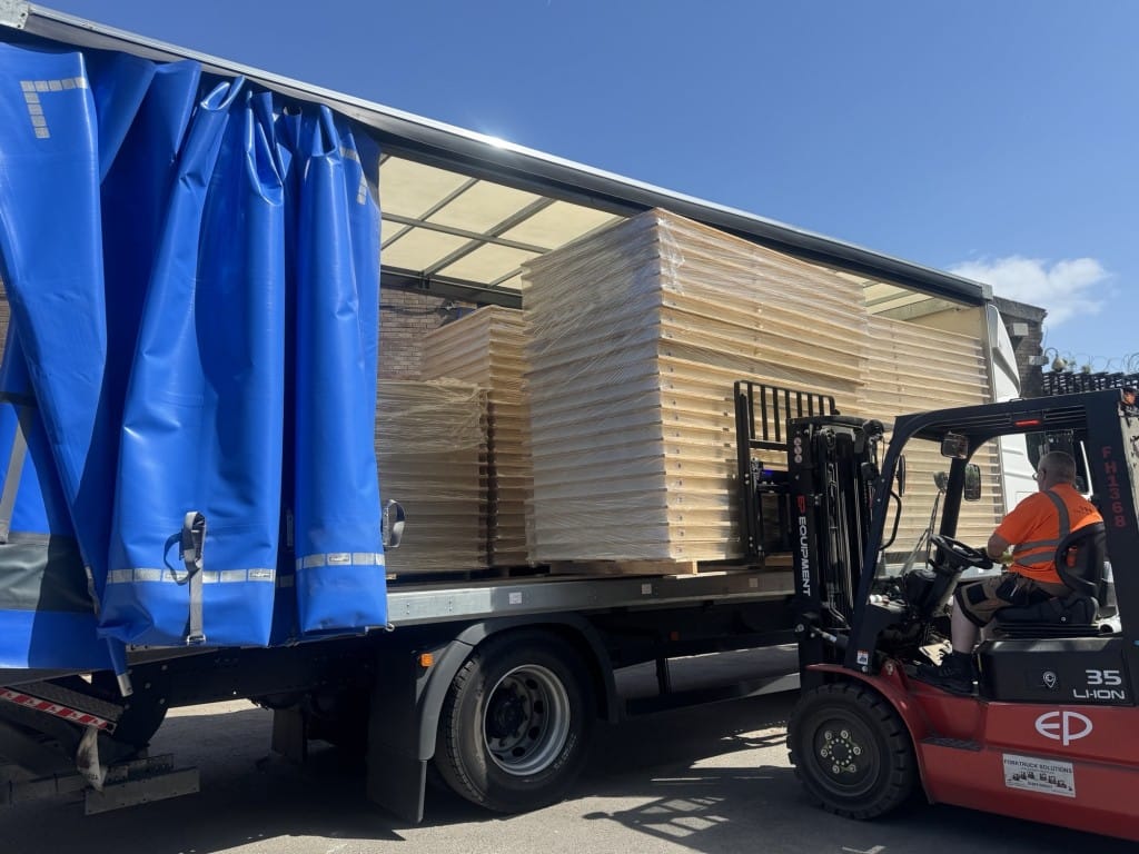 LIFTING SIPS ONTO VAN